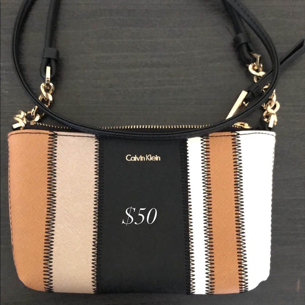 Cross body that’s like new b/c I hardly used it.